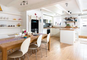 Large spacious kitchen and dining area, perfect for family meals.