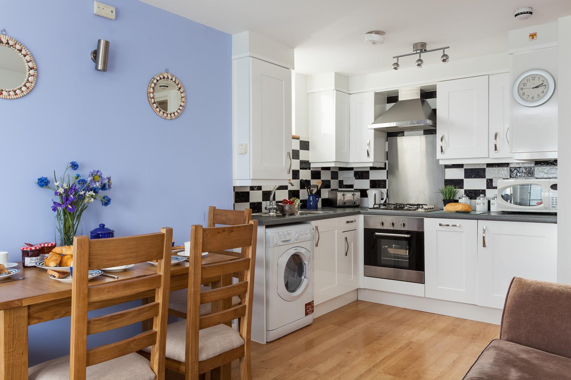 Cook up your favourite meal in the well-equipped kitchen. 