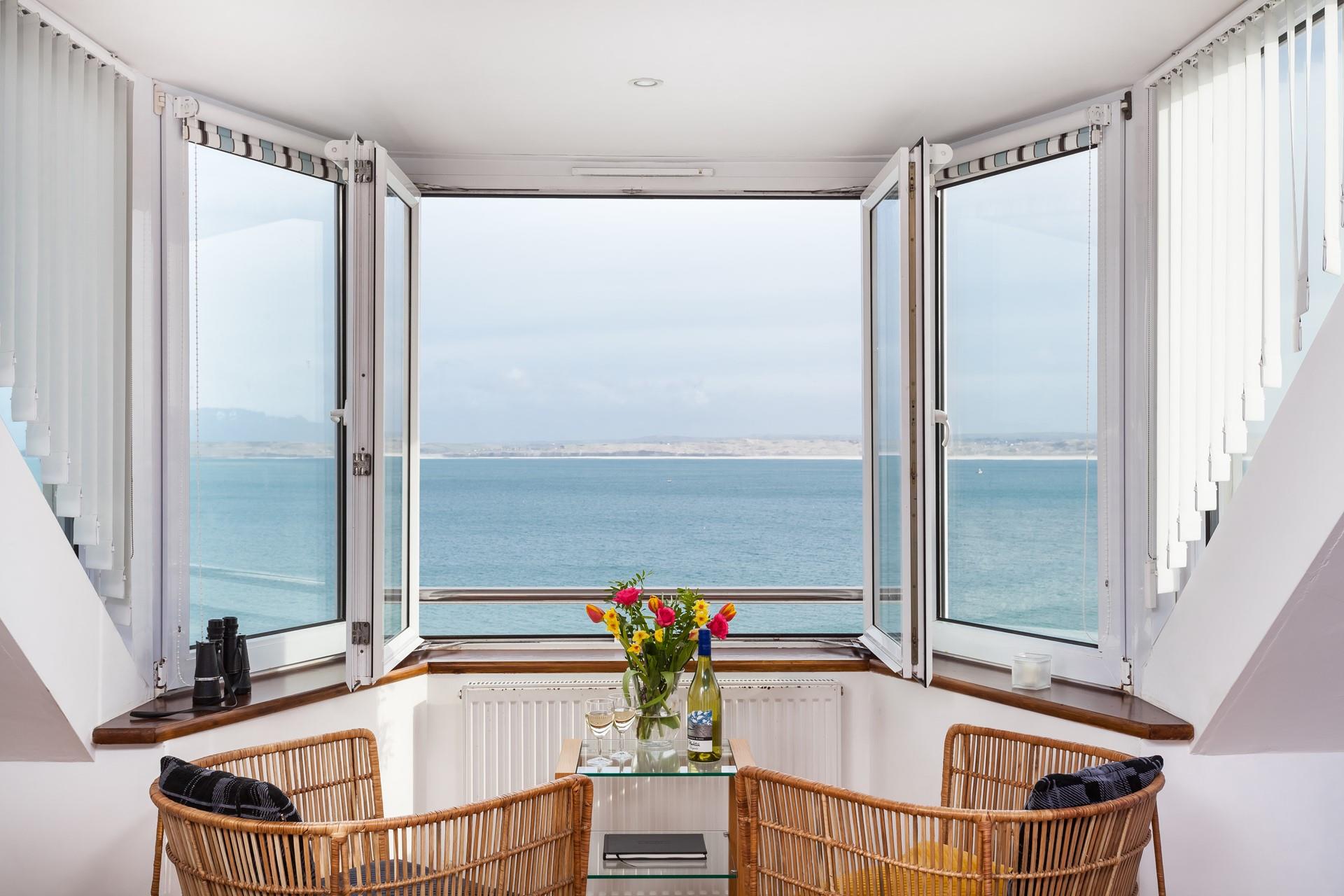 Kick back and relax, making the most of the incredible sea view.