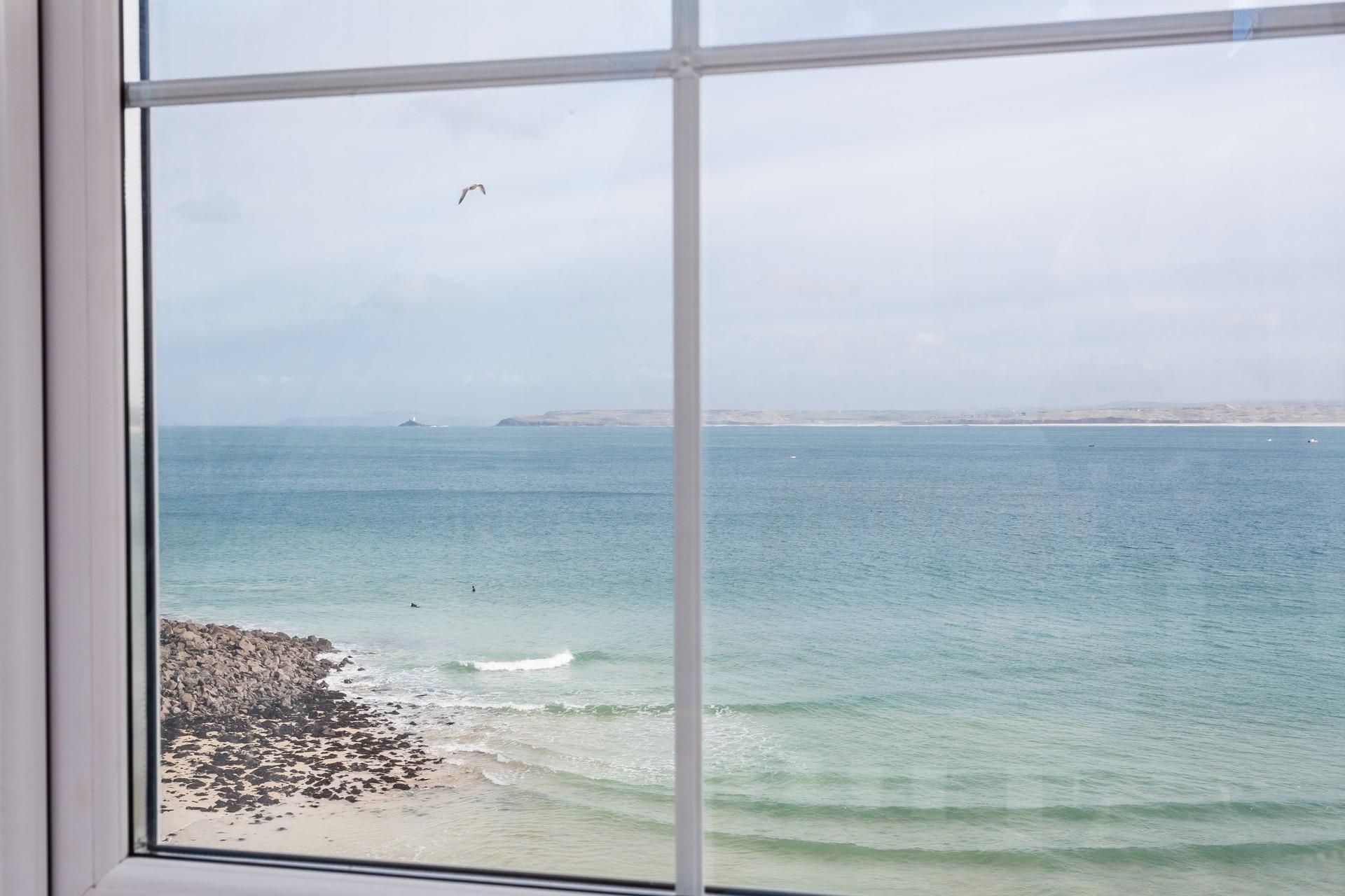 Sip your morning coffee as you watch the sunrise over St Ives.
