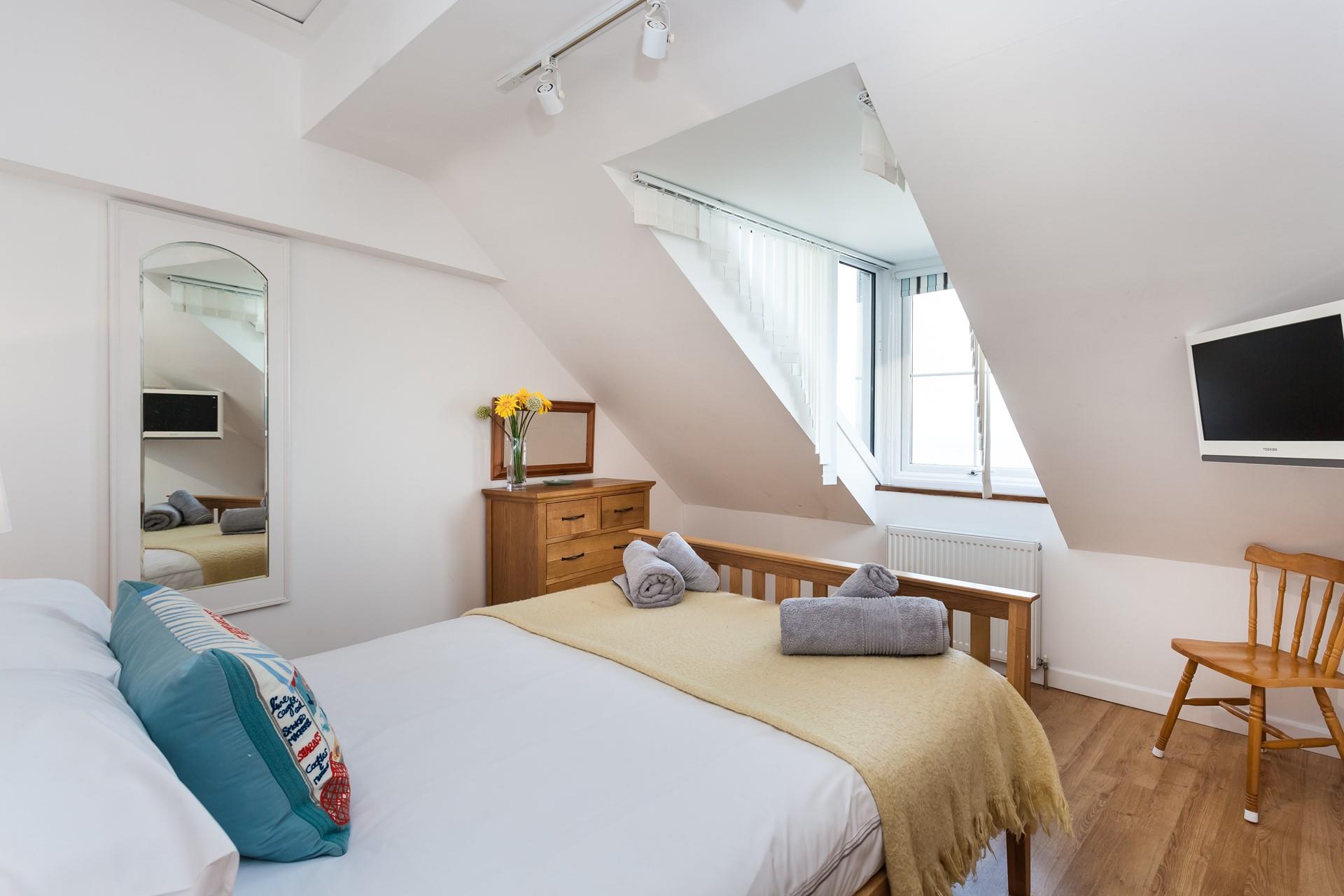 Stunning dormer windows allow you to make the most of the views, even from the bedroom.