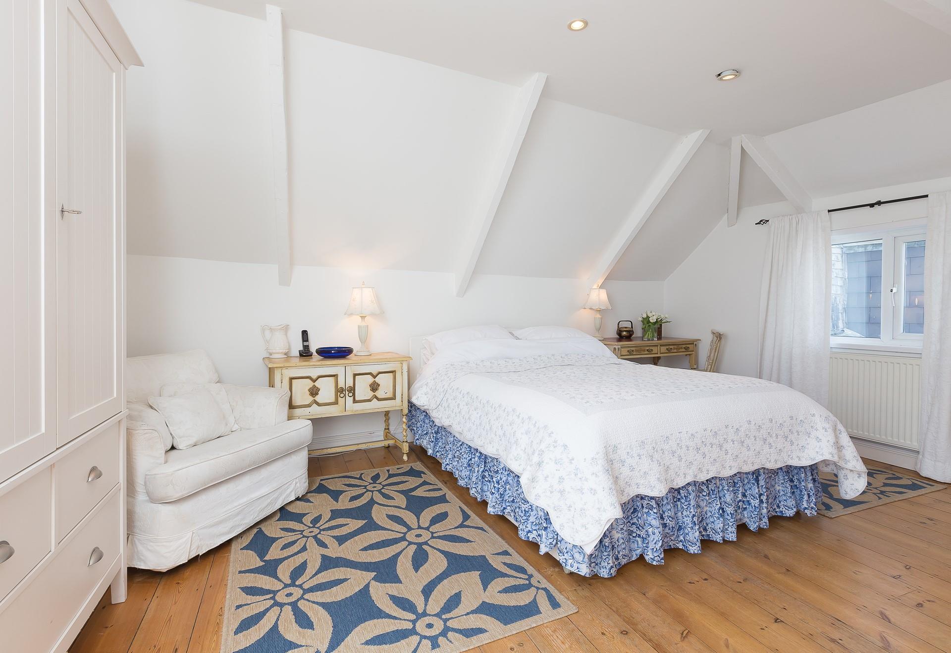 Bedroom 1 has a king size bed for you to drift off to sleep each night.