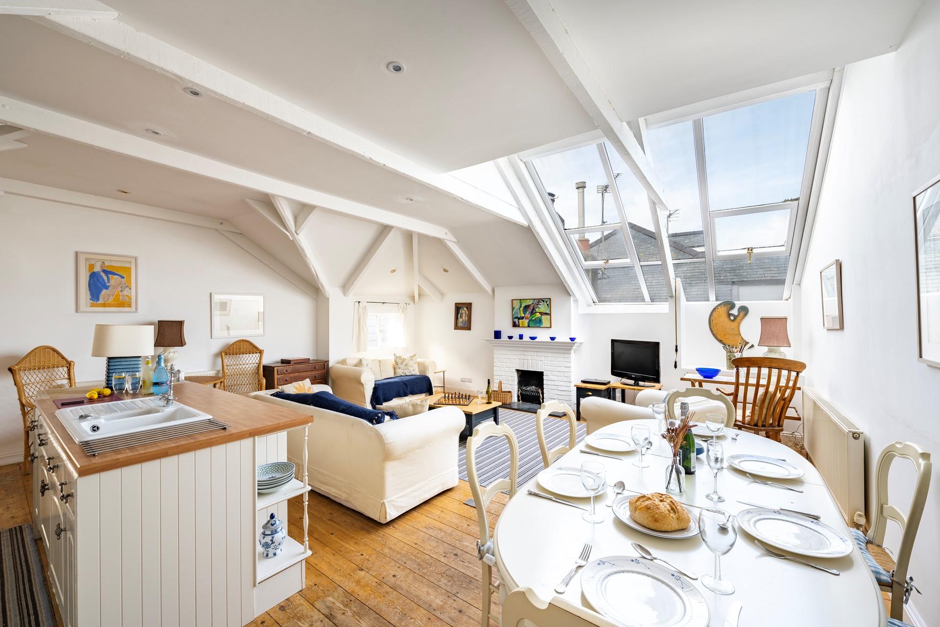 You will enter 25 The Digey via a flight of external steps. The large open plan sitting room is then on entry level.