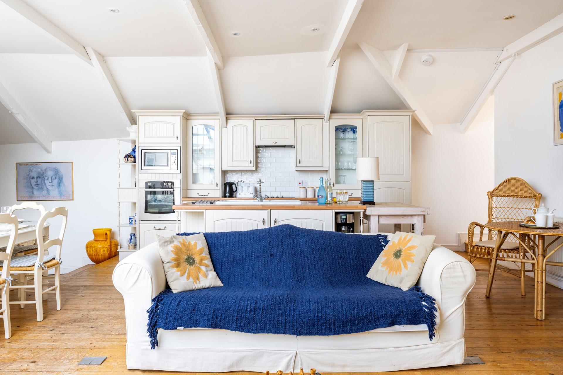 Sink into the sofa after a coastal path walk to unwind.