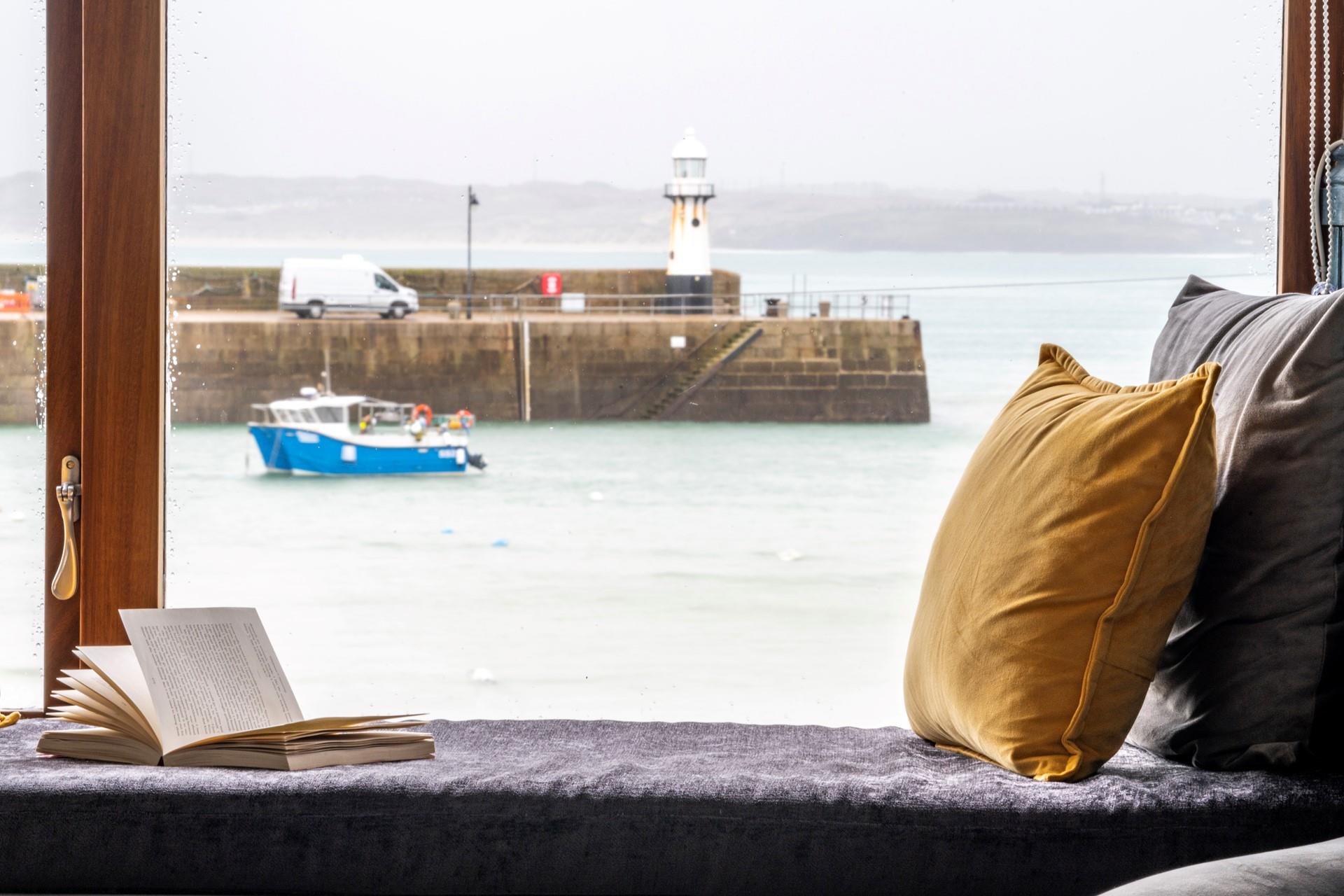 The perfect reading spot! Watch the boats coming and going in the harbour.