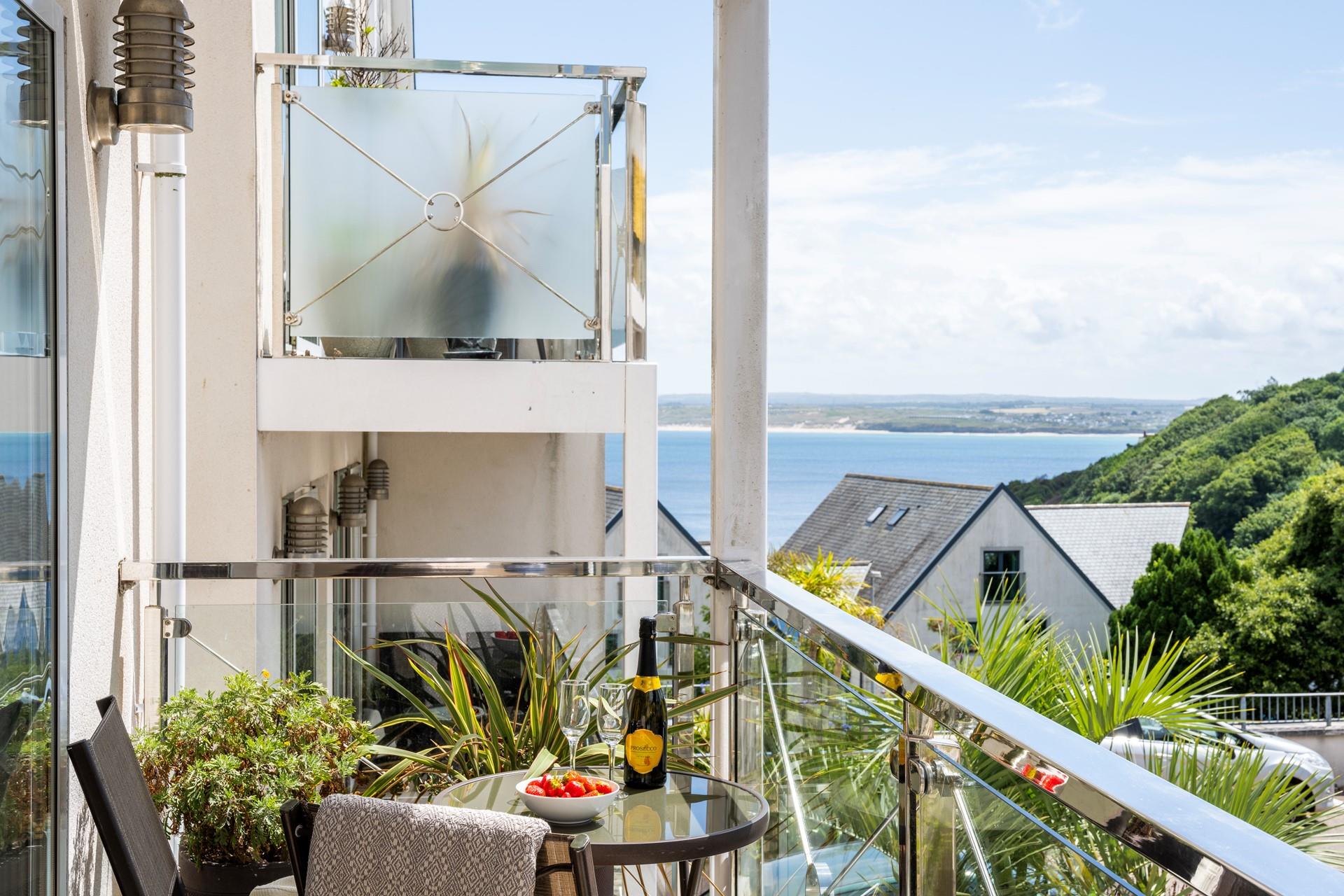 Soak up the sea views on the balcony whilst sipping a cold glass of wine.