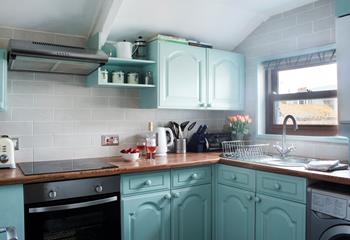 You will find the seaside-themed kitchen well-equipped with everything you need to whip up delicious meals.