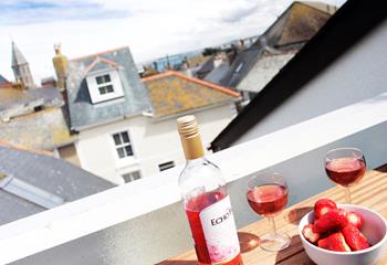 Enjoy a glass of wine from the roof terrace area, with a sea view across the roof tops.