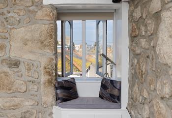 Enjoy the sea views over the rooftops.