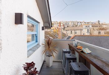 Enjoy a cuppa from the roof terrace area, with a sea view across the roof tops.