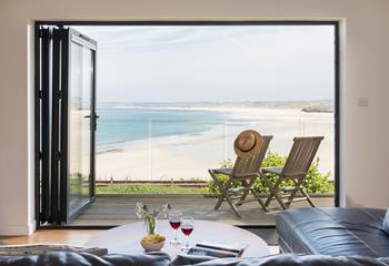 Open the bi-fold doors and enjoy the uninterrupted, picture-perfect view across Hayle and Godrevy.