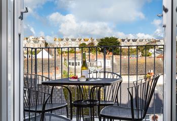 Enjoy a cold glass of wine on the balcony in the early evening sunshine.
