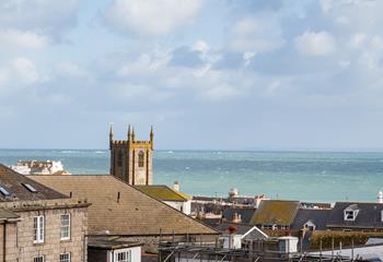 Watch the waves and enjoy the views over St Ives Bay.
