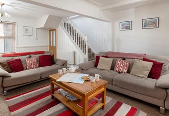 Relax in the charming sitting area after a lovely long walk along the coast.