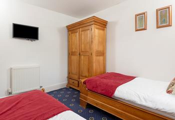 There is a large wardrobe to unpack all your holiday clothes.