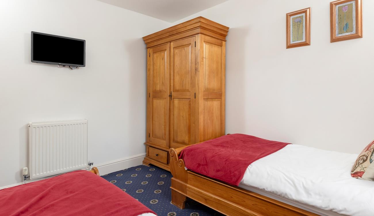 There is a large wardrobe to unpack all your holiday clothes.