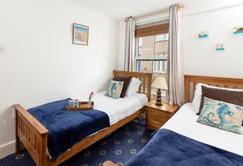 The twin beds are ideal for children or young adults.