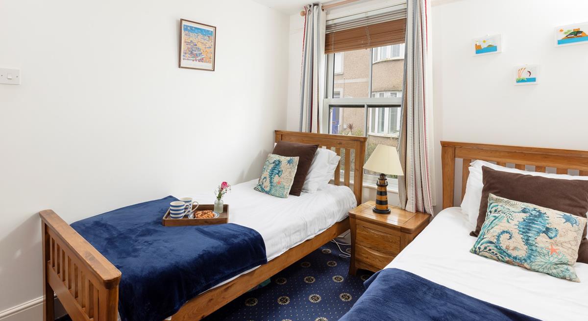 The twin beds are ideal for children or young adults.