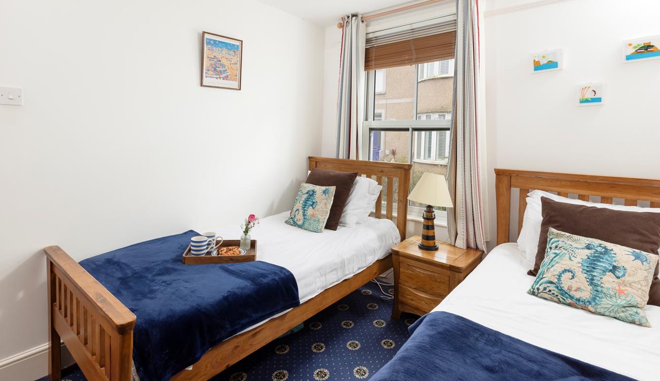 The twin beds are ideal for children or young adults.