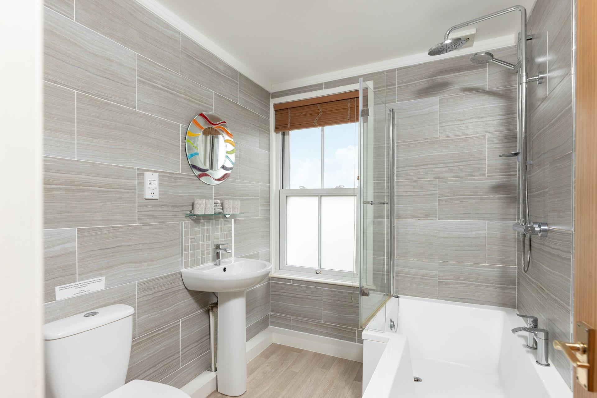 Modern bathroom with bath - perfect to relax in after a long day!