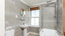 Modern bathroom with bath - perfect to relax in after a long day!
