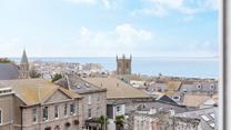 Watch the waves and enjoy the views over St Ives Bay.
