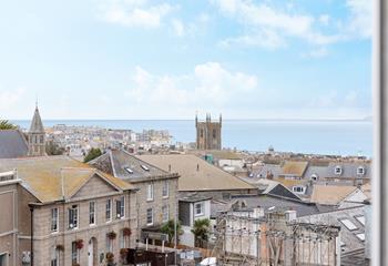 Watch the waves and enjoy the views over St Ives Bay.
