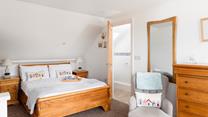 Tuck yourself into the soft sheets in the spacious double bed and drift off to sleep.