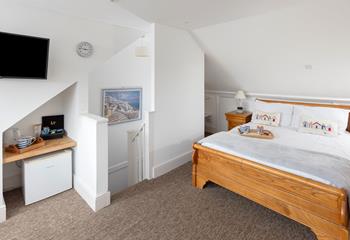 The loft has been converted into a lovely double bedroom.