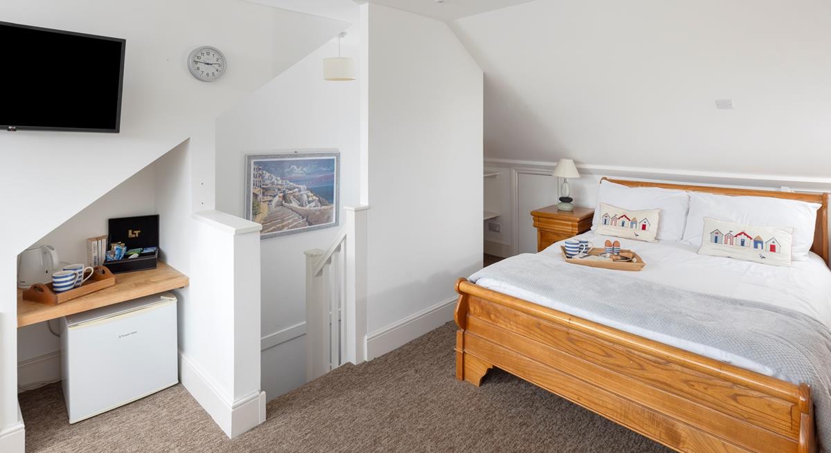The loft has been converted into a lovely double bedroom.