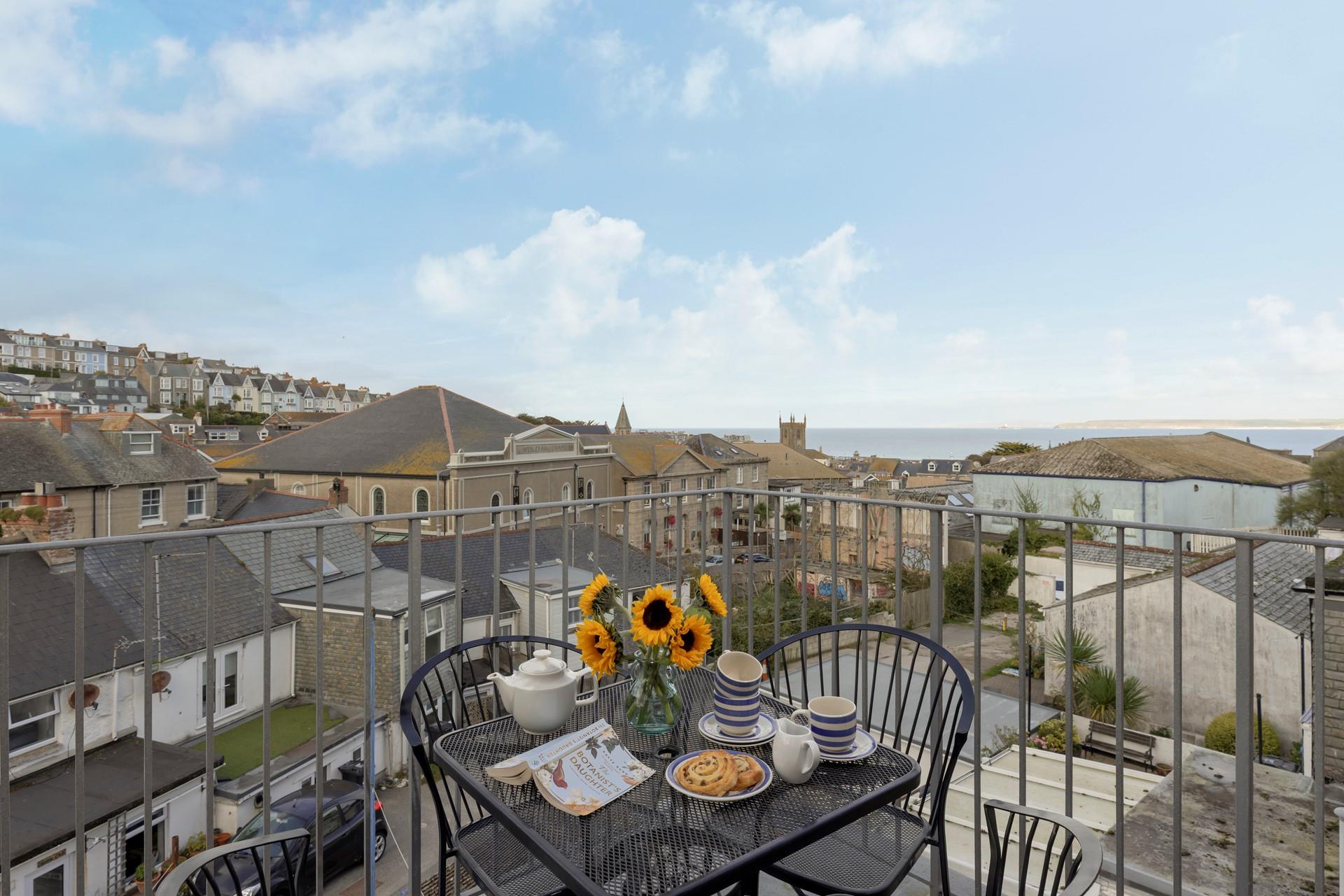 Enjoy a cuppa on the balcony in the early evening sunshine.