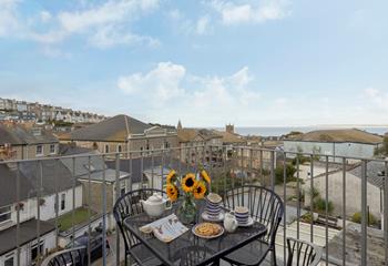Enjoy a cuppa on the balcony in the early evening sunshine.