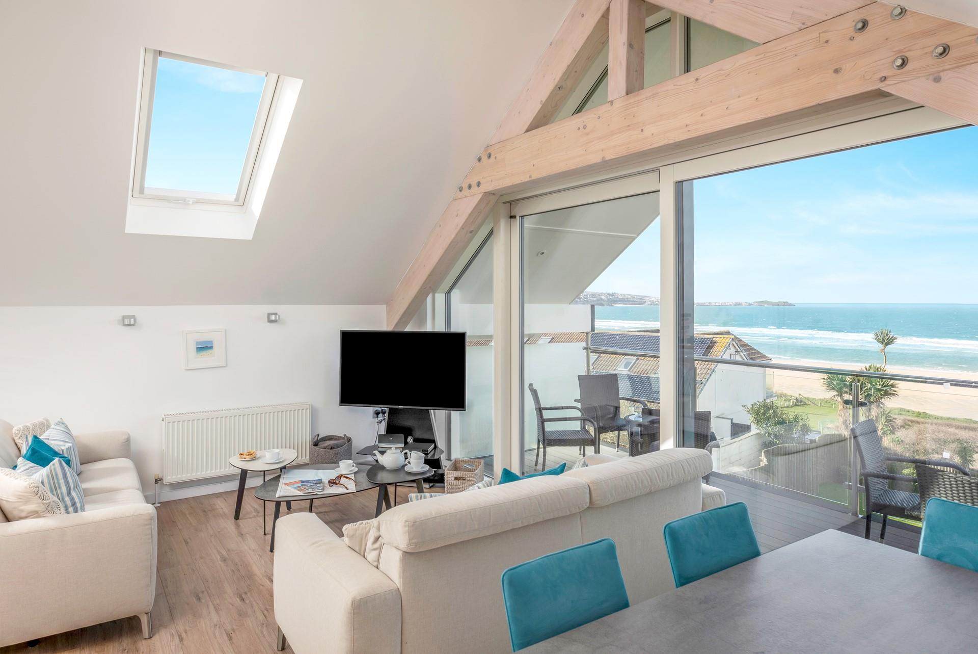 After a day spent at the beach come back and watch the sun go down on your balcony.