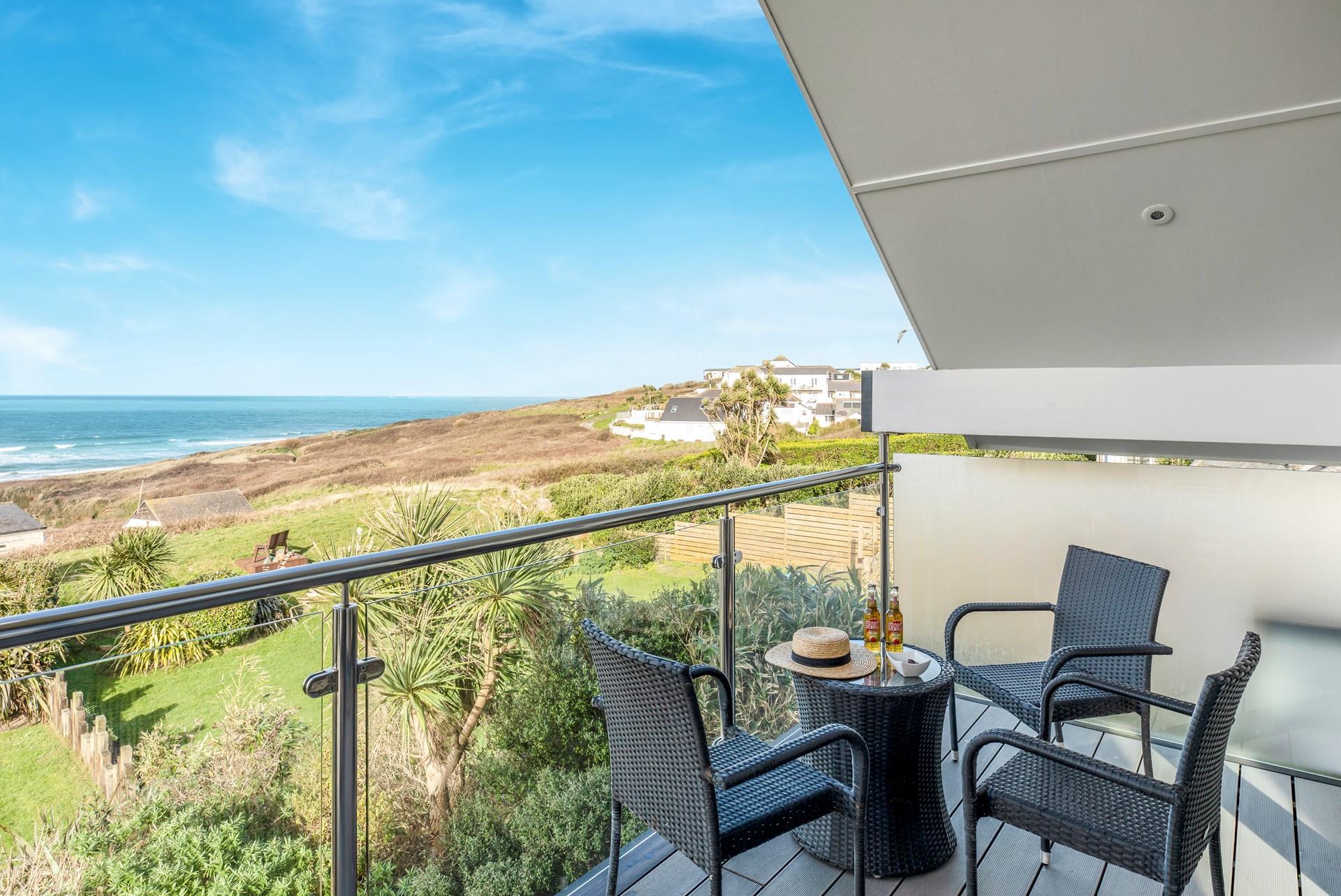 Spend the day on the beach and come back to sip a cold drink on the balcony.