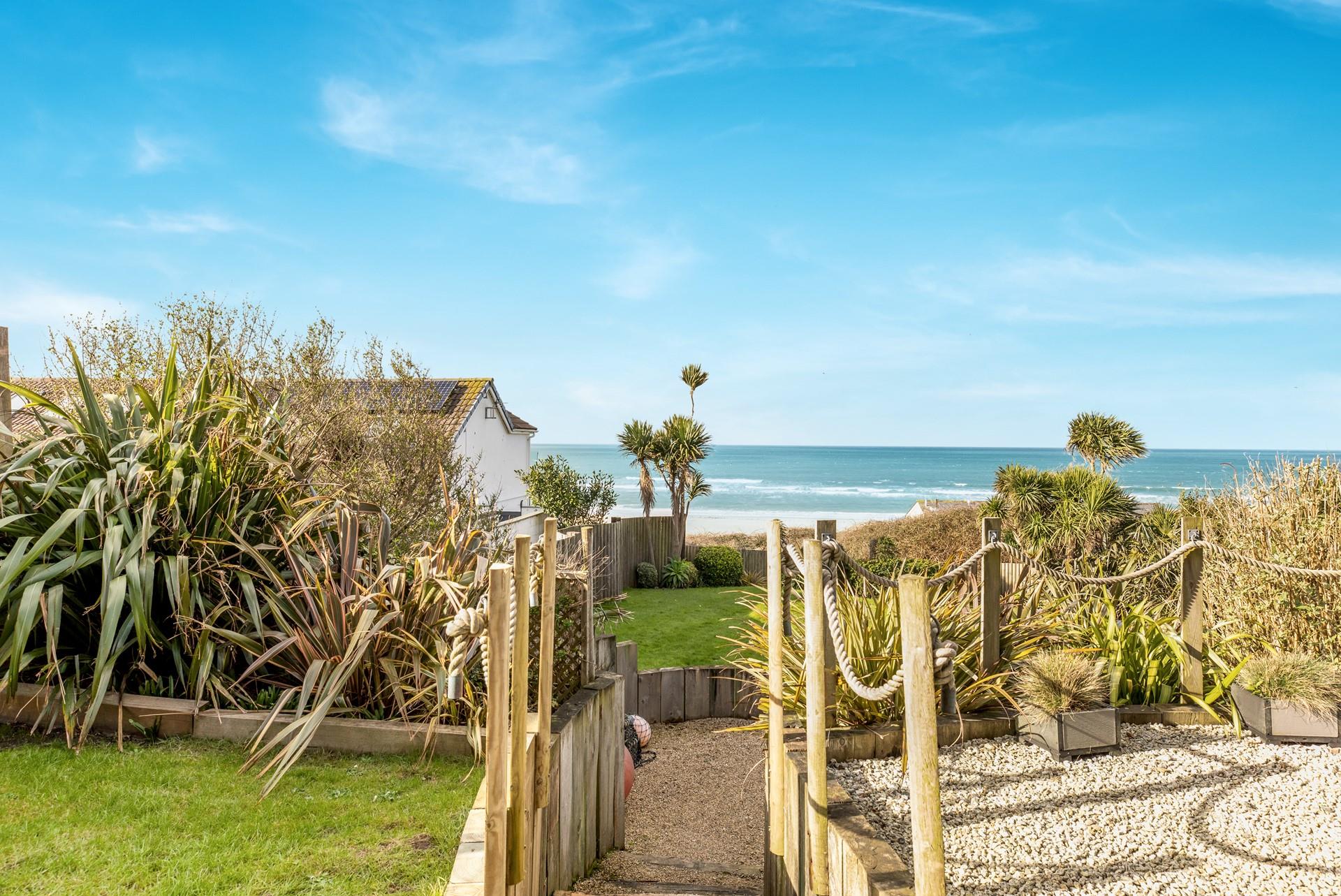 Wander the private path down to the beautiful sandy beach.