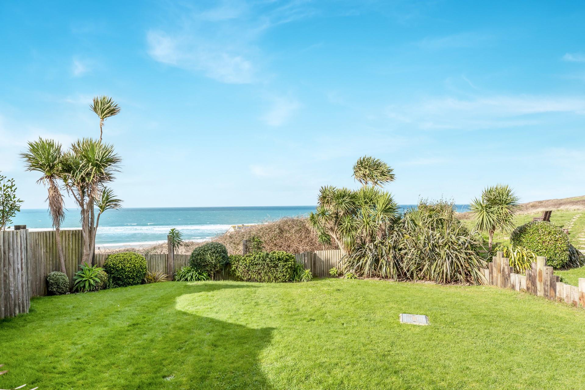 Access the beach from your very own back garden, you can be lying in the sand in minutes.