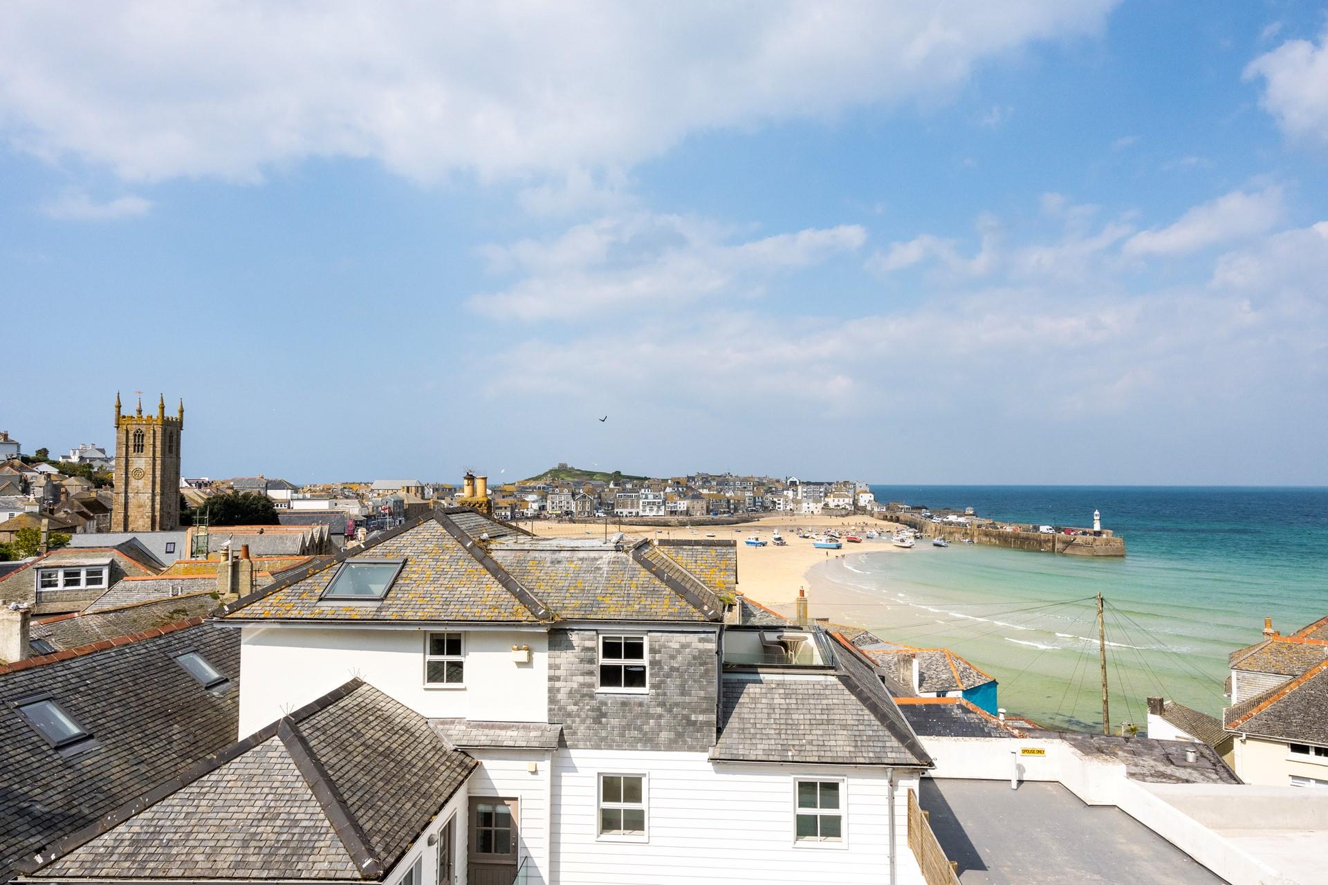 Wander down to the beach to take a dip in the turquoise waters.