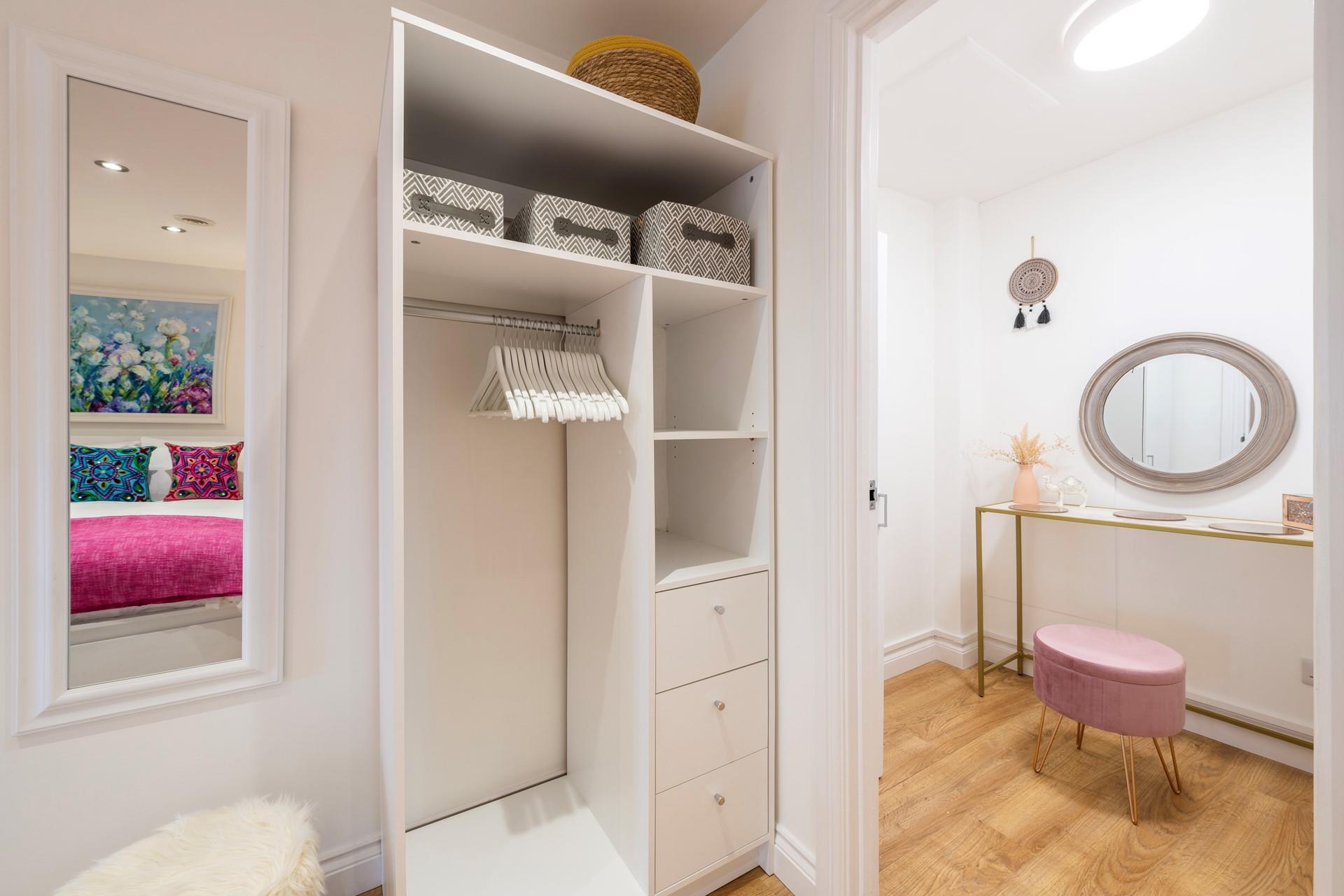 The separate dressing room allows space to get ready in the morning.