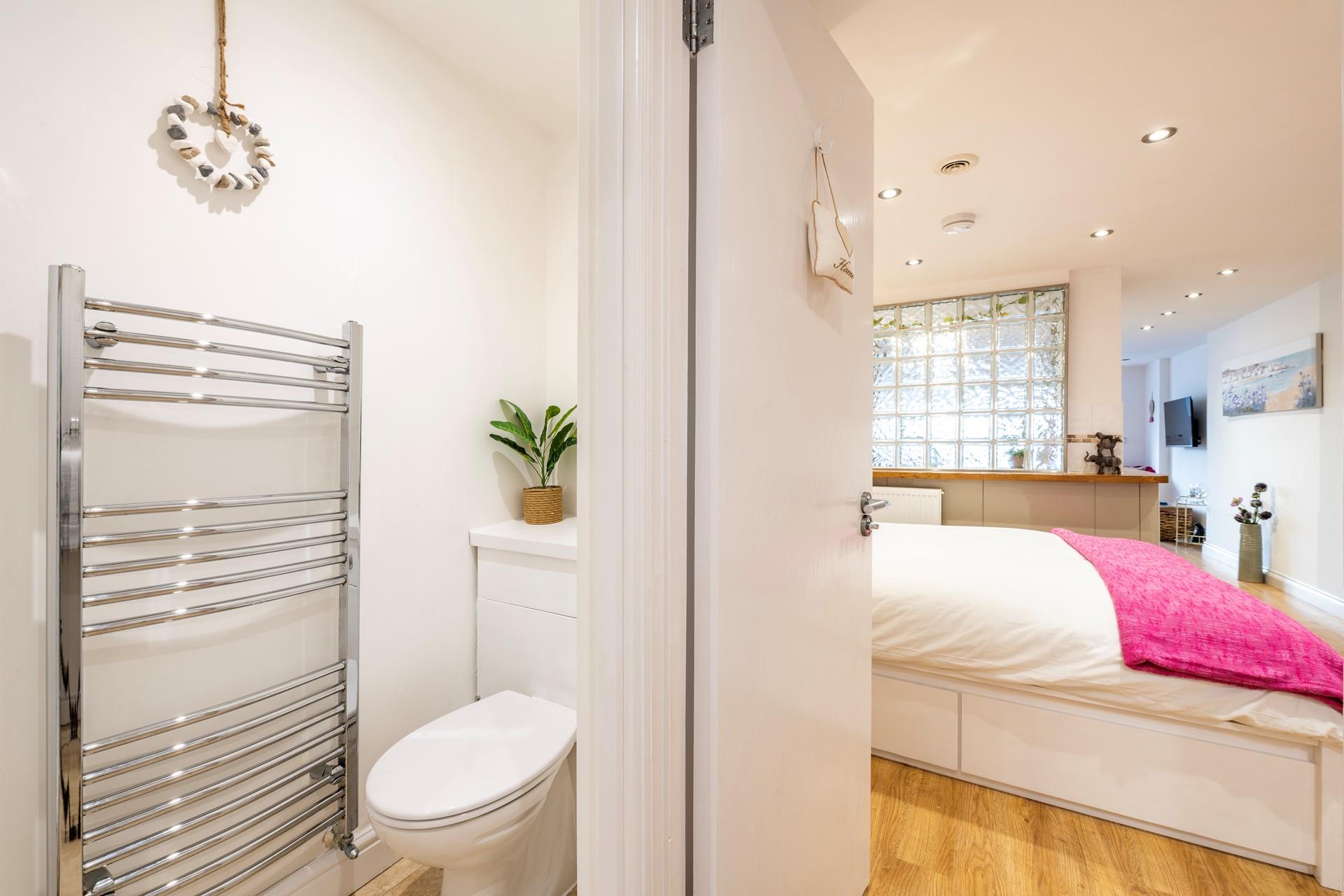 After a day on Porthminster beach, come back to wash off sandy toes in the shower.