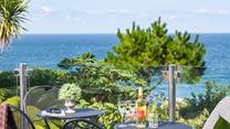 Sit and while away the hours staring out to sea.