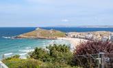 From the glass patio balcony, you have a birds-eye stunning view across Porthmeor beach and for miles beyond. - Thumbnail Image