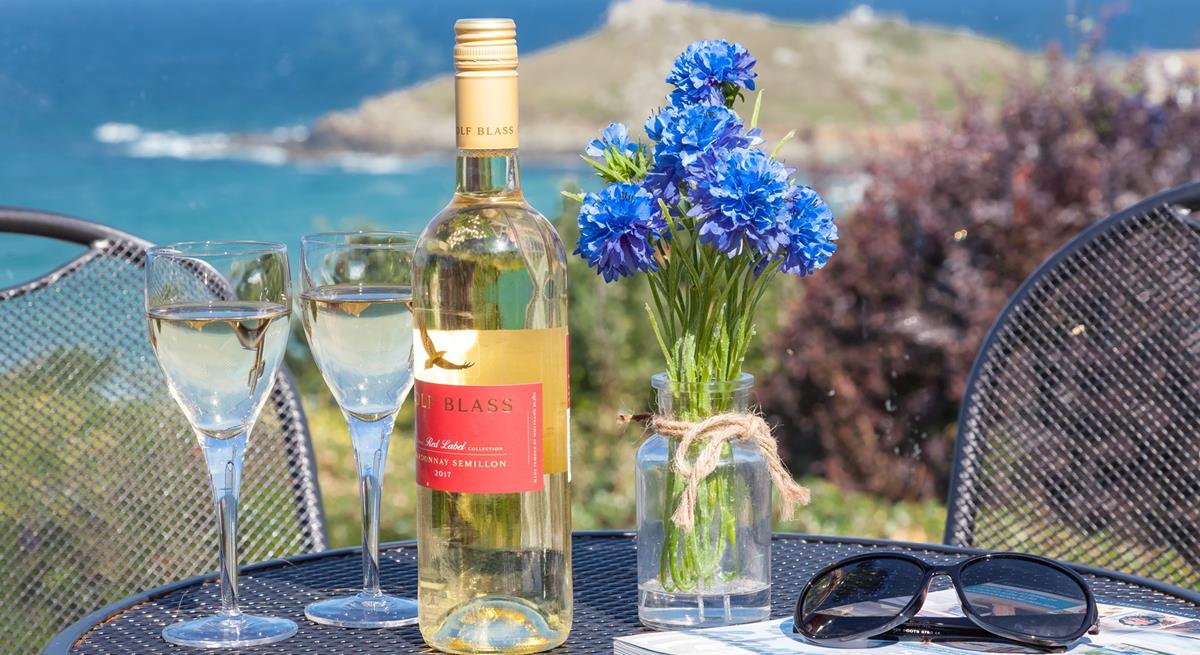 Enjoy a glass of wine and a good read on the terraced patio overlooking Porthmeor beach and the Island.