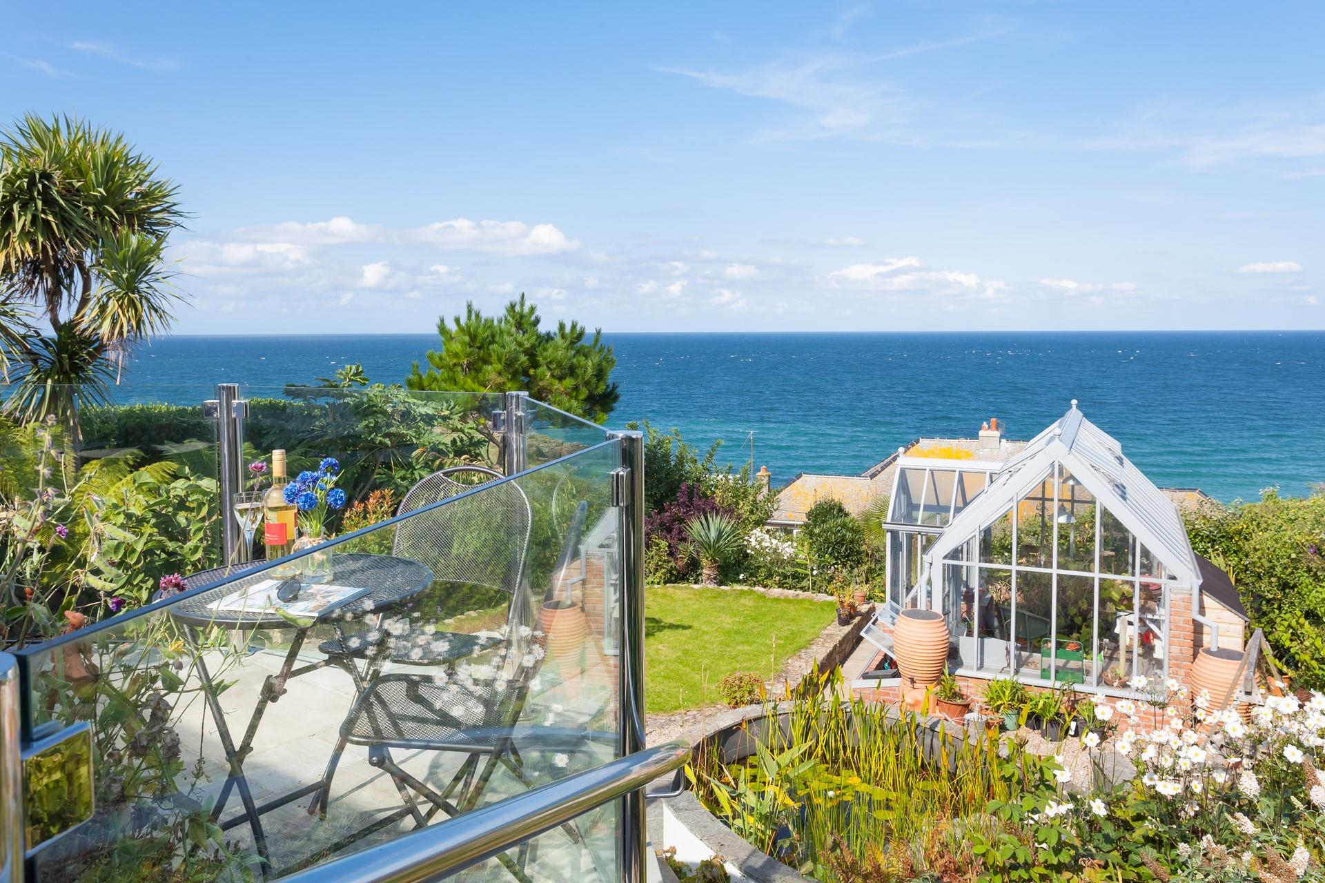 Wander back to this seaside retreat after a day on the beach.