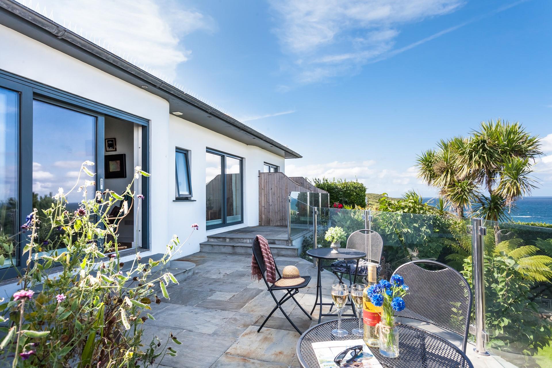 Sit outside on the terrace on a sunny afternoon and take in the stunning sea views.