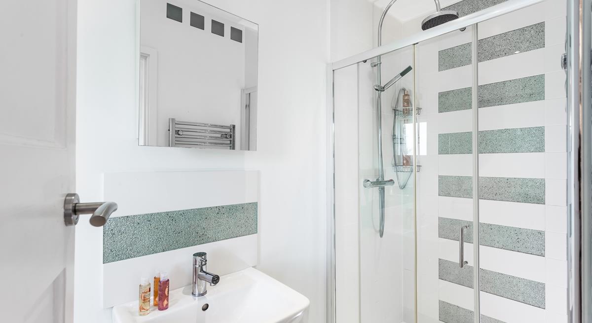 Wander into the ensuite for an invigorating morning shower.