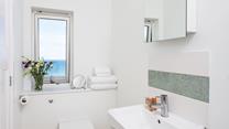 Get ready for the day in the en suite.
