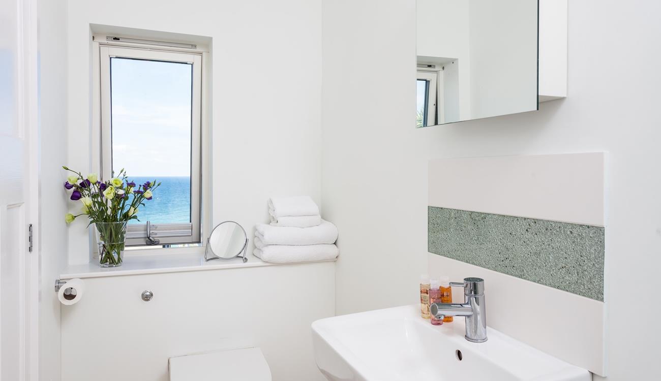 Get ready for the day in the en suite.