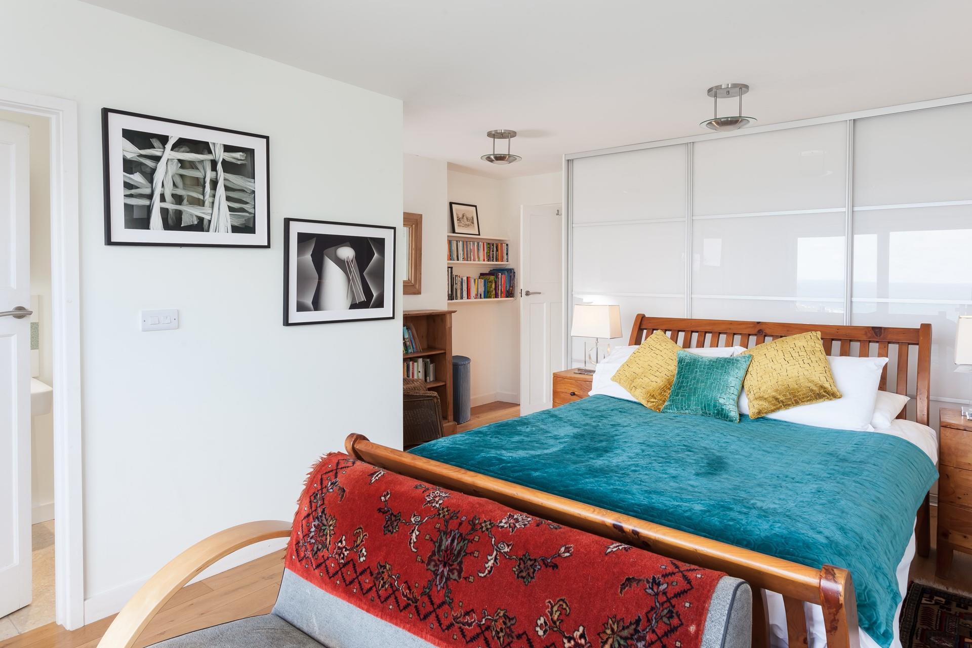 Bedroom 1 has a spacious king size bed offering a relaxing night's slumber.