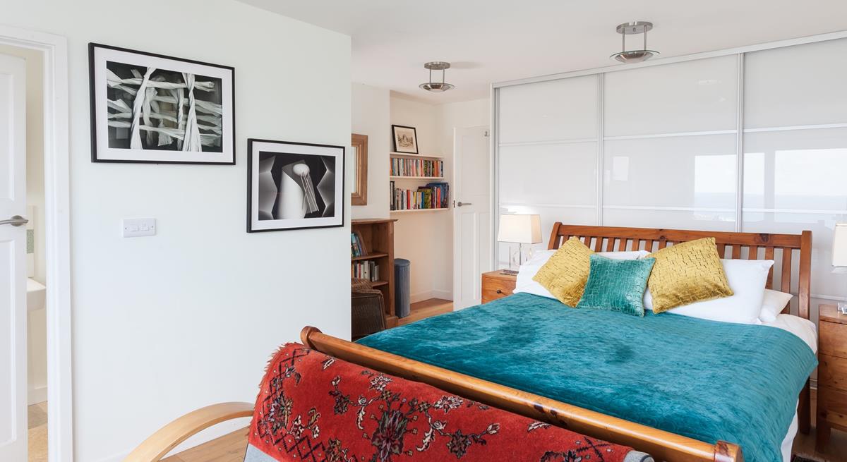 Bedroom 1 has a spacious king size bed offering a relaxing night's slumber.