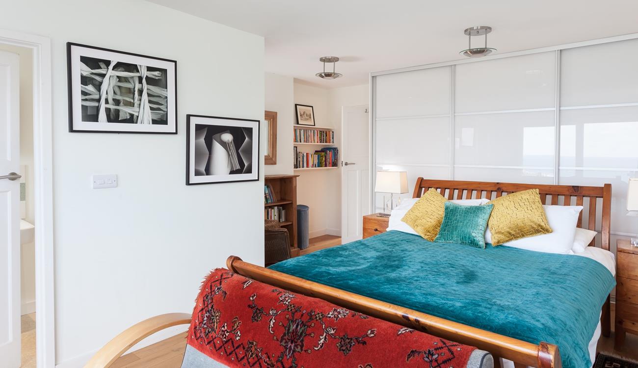 Bedroom 1 has a spacious king size bed offering a relaxing night's slumber.